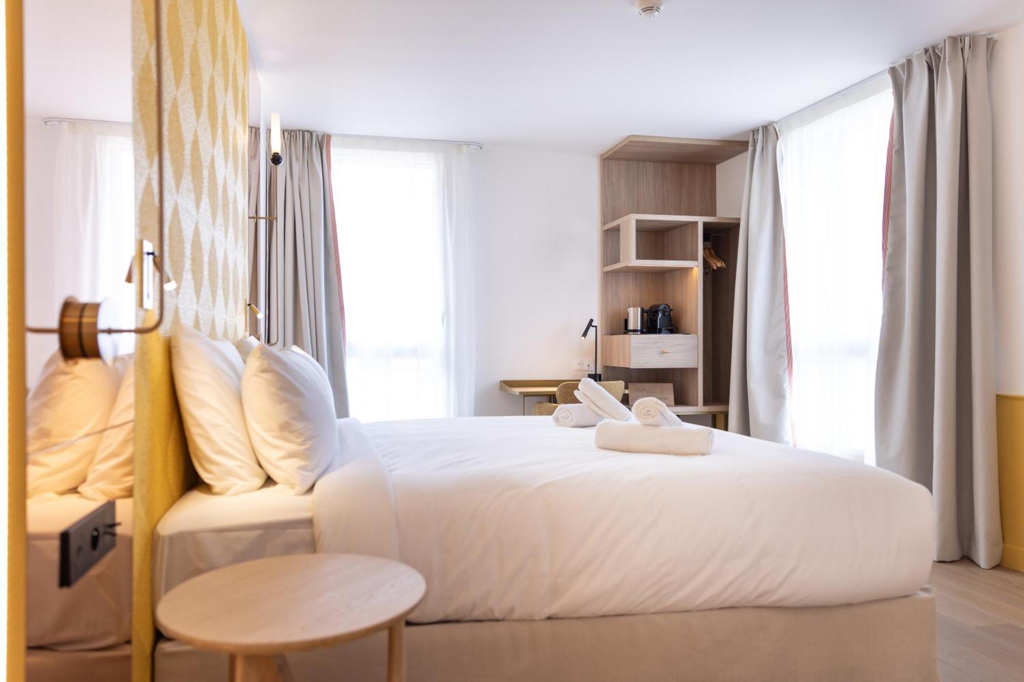 Hotel Kyriad Prestige Paris Asnieres Exterior foto